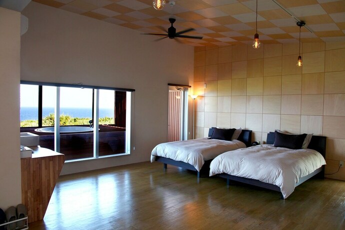 Imagen de la habitación del Hotel isola villa kouri. Foto 11