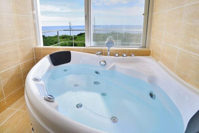 Imagen de la habitación del Hotel isola villa kouri. Foto 12