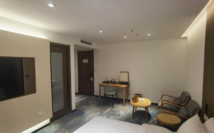 Imagen de la habitación del Hotel jiu shu feng wu mei shu guan jiu dian. Foto 12