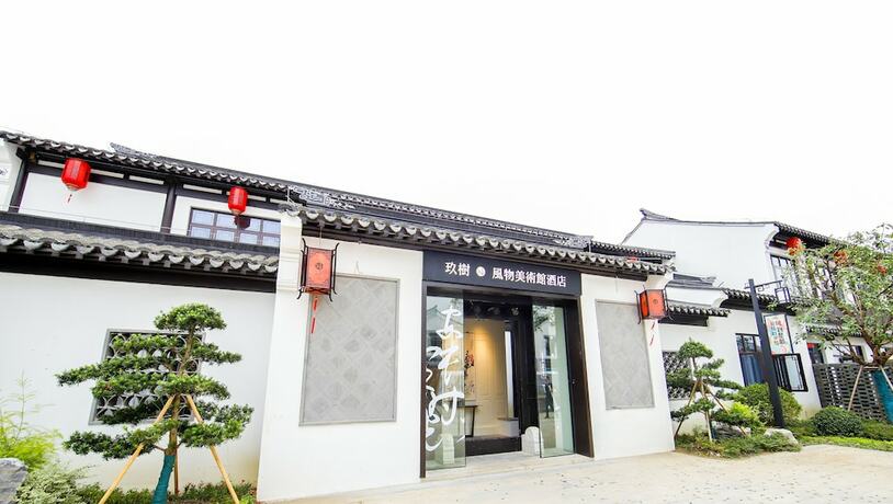 Imagen general del Hotel jiu shu feng wu mei shu guan jiu dian. Foto 3
