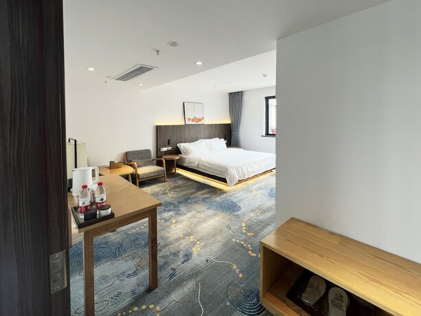 Imagen general del Hotel jiu shu feng wu mei shu guan jiu dian. Foto 4