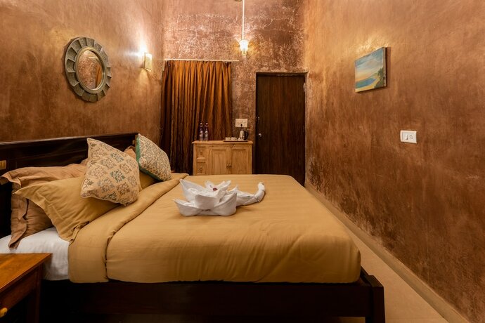 Imagen de la habitación del Hotel juSTa Morjim Beach Resort and Spa. Foto 15