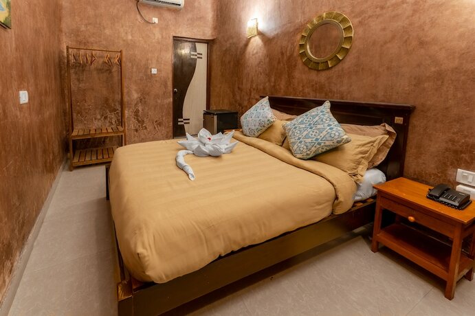 Imagen de la habitación del Hotel juSTa Morjim Beach Resort and Spa. Foto 18