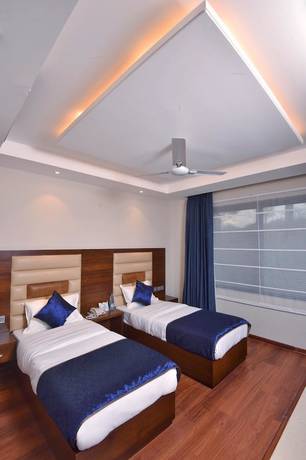 Imagen de la habitación del Hotel juSTa Palampur Resort and Convention Centre. Foto 3