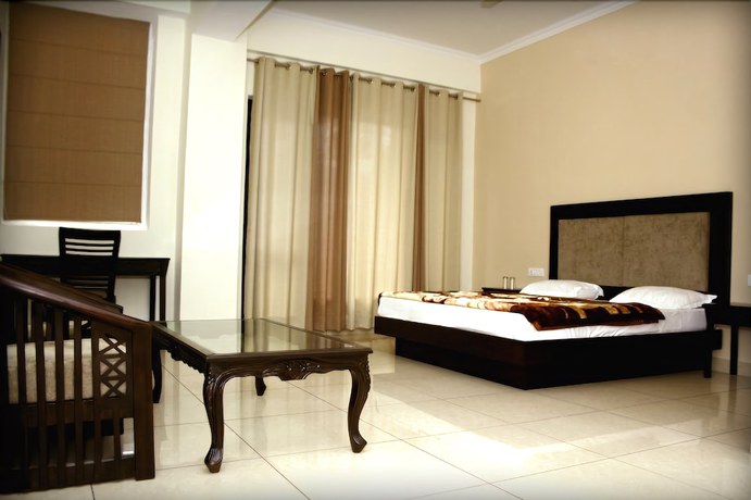 Imagen de la habitación del Hotel juSTa Palampur Resort and Convention Centre. Foto 5