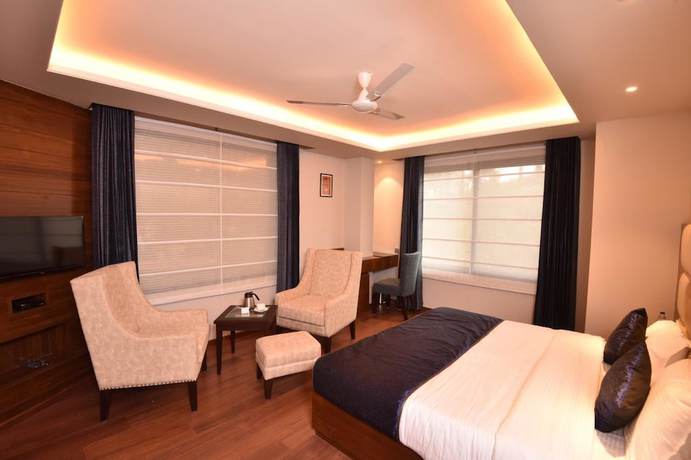 Imagen de la habitación del Hotel juSTa Palampur Resort and Convention Centre. Foto 16