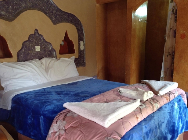 Imagen de la habitación del Hotel kasbah ifri. Foto 7