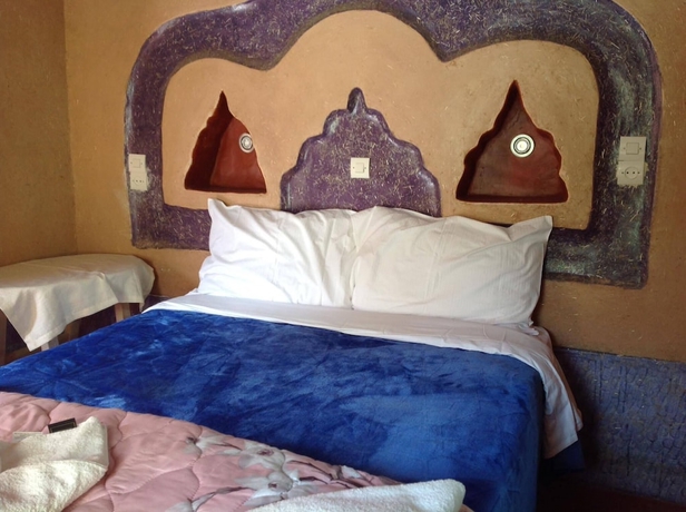 Imagen de la habitación del Hotel kasbah ifri. Foto 16