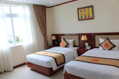 Imagen de la habitación del Hotel kh&aacute;ch sạn happy kỳ long. Foto 8