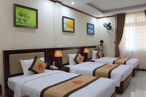 Imagen de la habitación del Hotel kh&aacute;ch sạn happy kỳ long. Foto 9