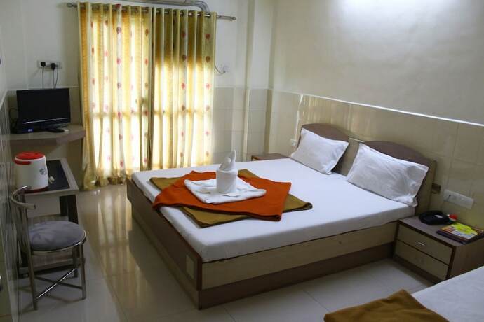 Imagen de la habitación del Hotel krishna Park Resort. Foto 15