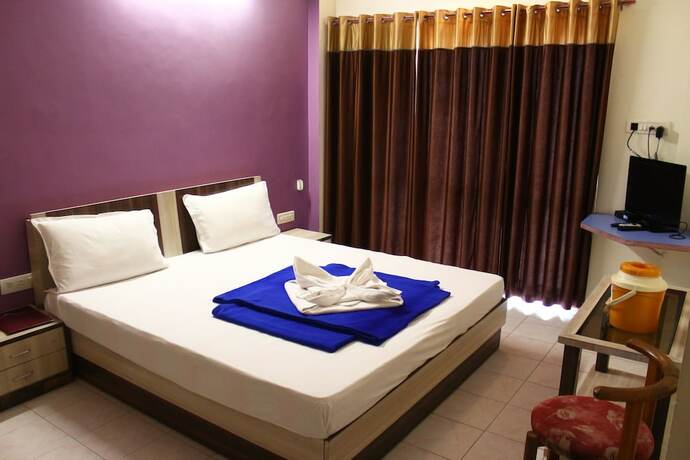 Imagen de la habitación del Hotel krishna Park Resort. Foto 17