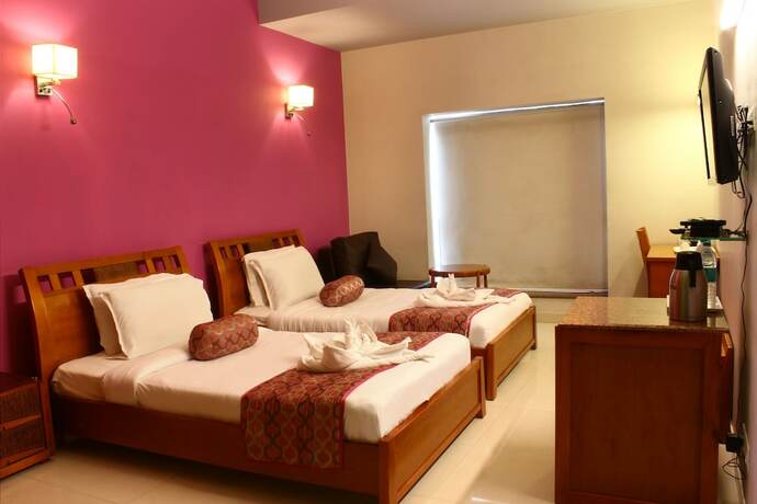 Imagen de la habitación del Hotel krishna Park Resort. Foto 18