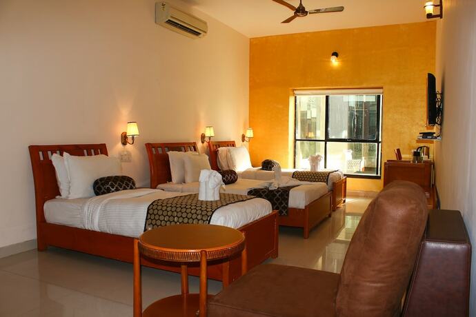 Imagen de la habitación del Hotel krishna Park Resort. Foto 19