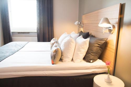 Imagen de la habitación del Hotel l Aston. Foto 8