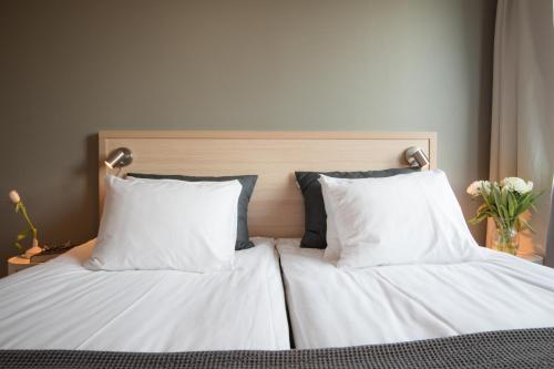 Imagen de la habitación del Hotel l Aston. Foto 9