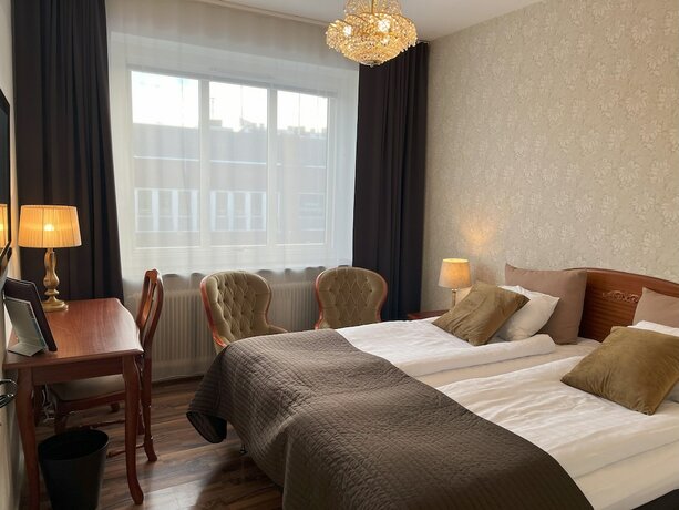 Imagen de la habitación del Hotel l Bele. Foto 15