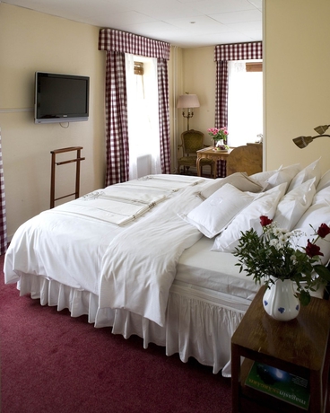 Imagen de la habitación del Hotel l Blå Blom. Foto 2