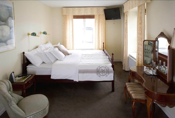 Imagen de la habitación del Hotel l Blå Blom. Foto 4