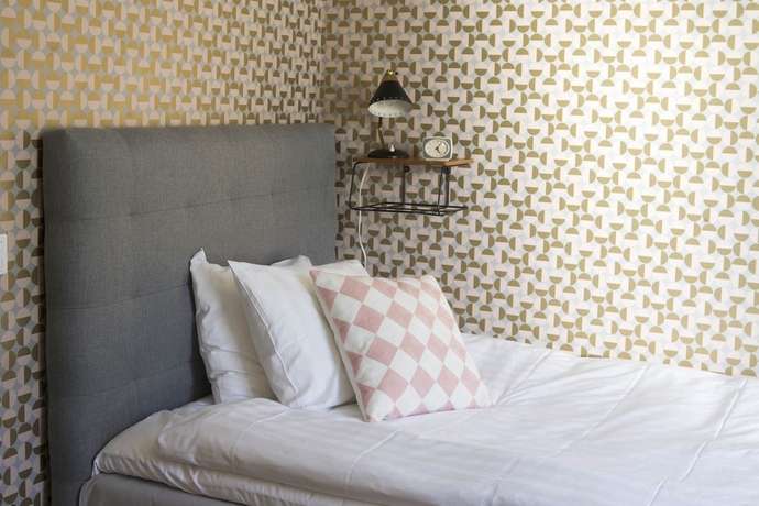 Imagen de la habitación del Hotel l Blå Blom. Foto 8