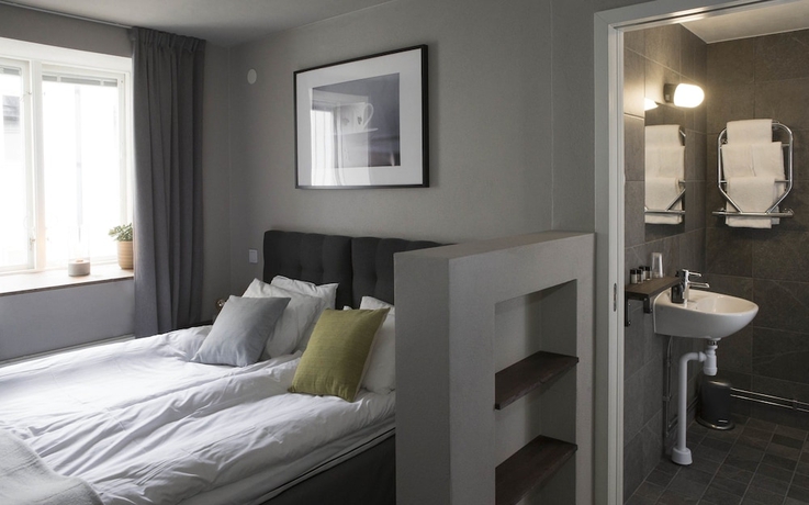 Imagen de la habitación del Hotel l Blå Blom. Foto 12