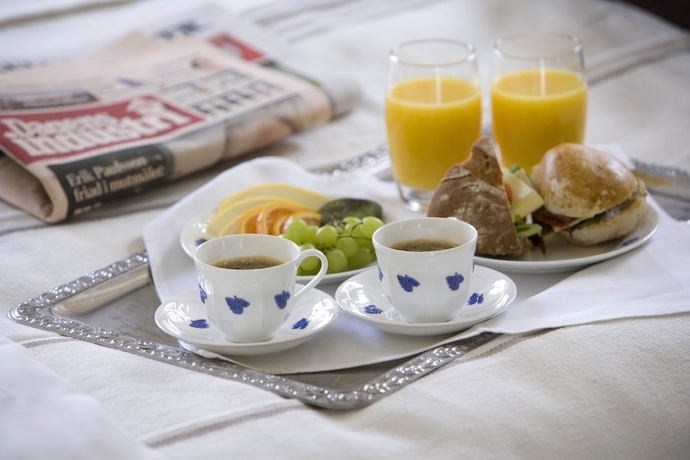 Imagen de la habitación del Hotel l Blå Blom. Foto 14