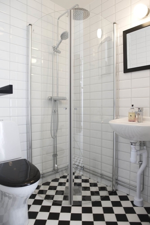 Imagen de la habitación del Hotel l Blå Blom. Foto 16