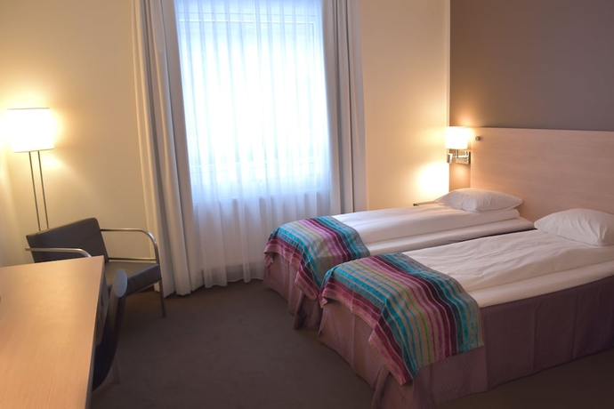 Imagen de la habitación del Hotel l Charlottenberg. Foto 6