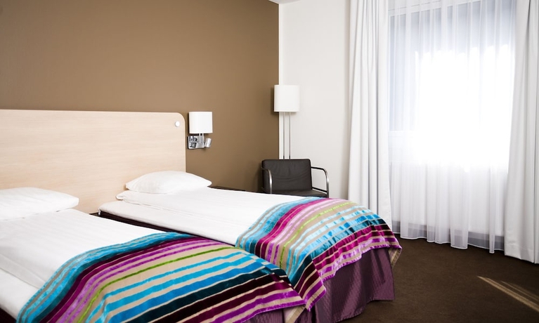 Imagen de la habitación del Hotel l Charlottenberg. Foto 12