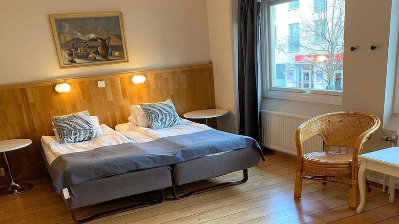 Imagen de la habitación del Hotel l City. Foto 8