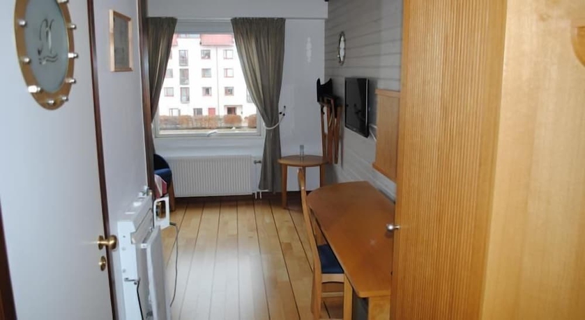 Imagen de la habitación del Hotel l City. Foto 10