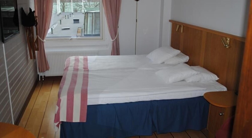 Imagen de la habitación del Hotel l City. Foto 11