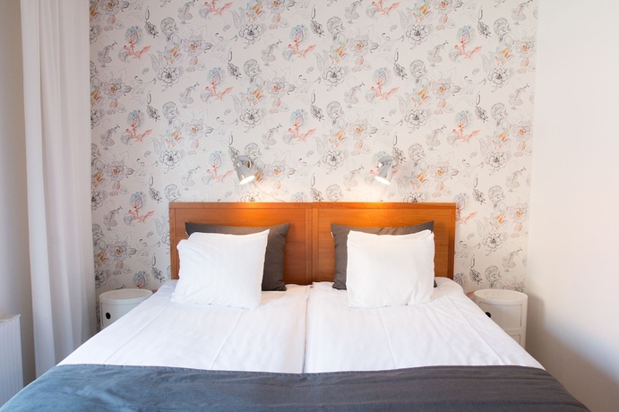 Imagen de la habitación del Hotel l Conrad. Foto 3