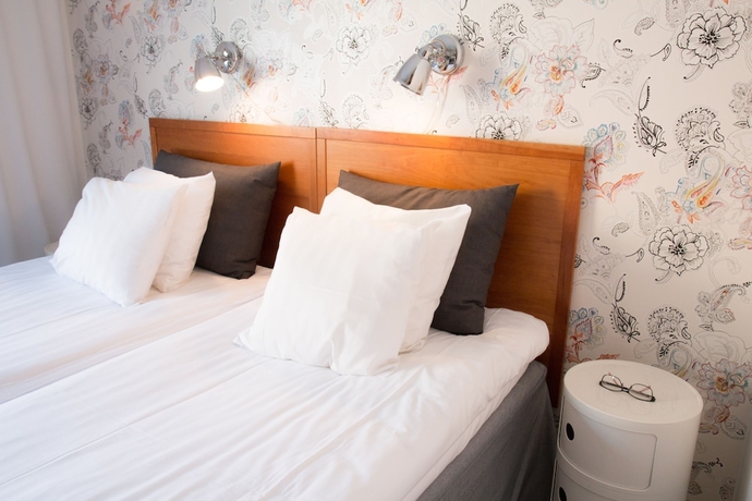 Imagen de la habitación del Hotel l Conrad. Foto 4