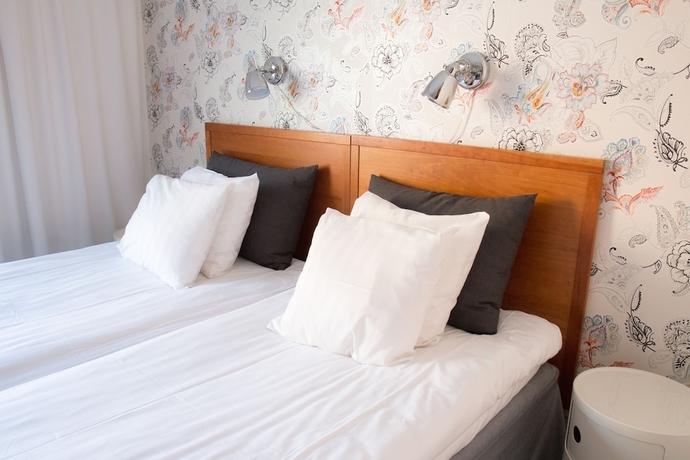 Imagen de la habitación del Hotel l Conrad. Foto 5