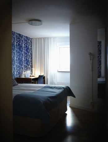 Imagen de la habitación del Hotel l Conrad. Foto 8