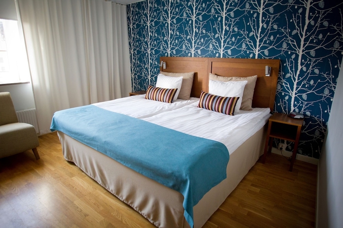 Imagen de la habitación del Hotel l Conrad. Foto 9