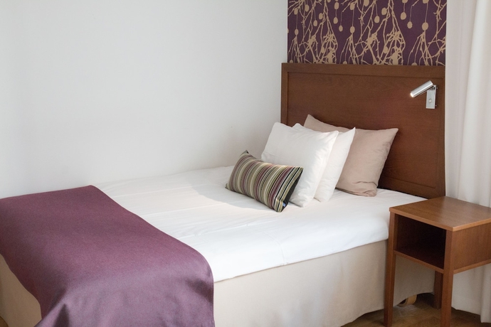 Imagen de la habitación del Hotel l Conrad. Foto 11