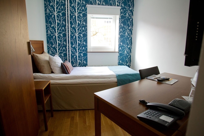 Imagen de la habitación del Hotel l Conrad. Foto 12