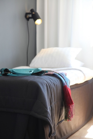 Imagen de la habitación del Hotel l Conrad. Foto 14