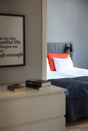 Imagen de la habitación del Hotel l Conrad. Foto 15