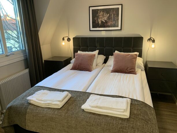 Imagen de la habitación del Hotel l Esplanad. Foto 14