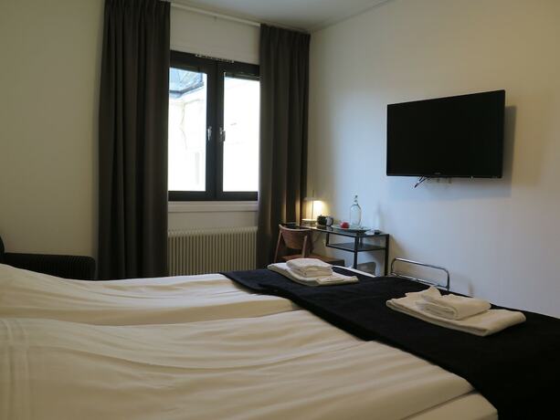 Imagen de la habitación del Hotel l Esplanad. Foto 16