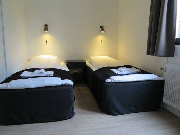 Imagen de la habitación del Hotel l Esplanad. Foto 22