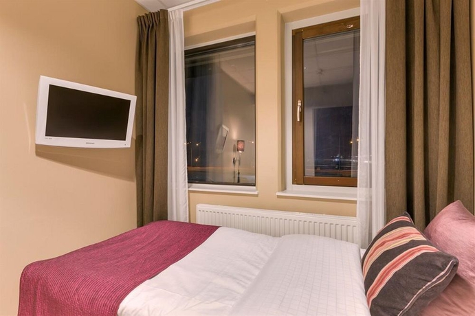 Imagen de la habitación del Hotel l Fyrislund. Foto 8