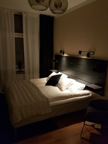 Imagen de la habitación del Hotel l Kong Christian. Foto 11