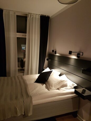 Imagen de la habitación del Hotel l Kong Christian. Foto 12