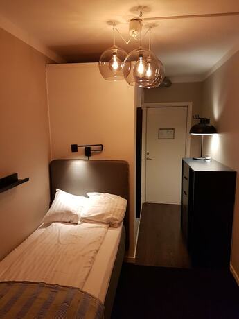 Imagen de la habitación del Hotel l Kong Christian. Foto 15