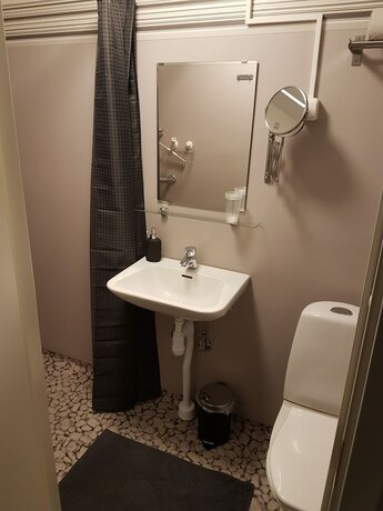 Imagen de la habitación del Hotel l Kong Christian. Foto 16