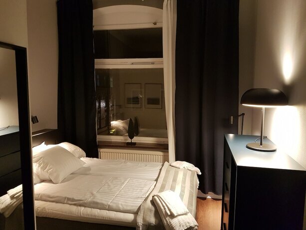 Imagen de la habitación del Hotel l Kong Christian. Foto 19